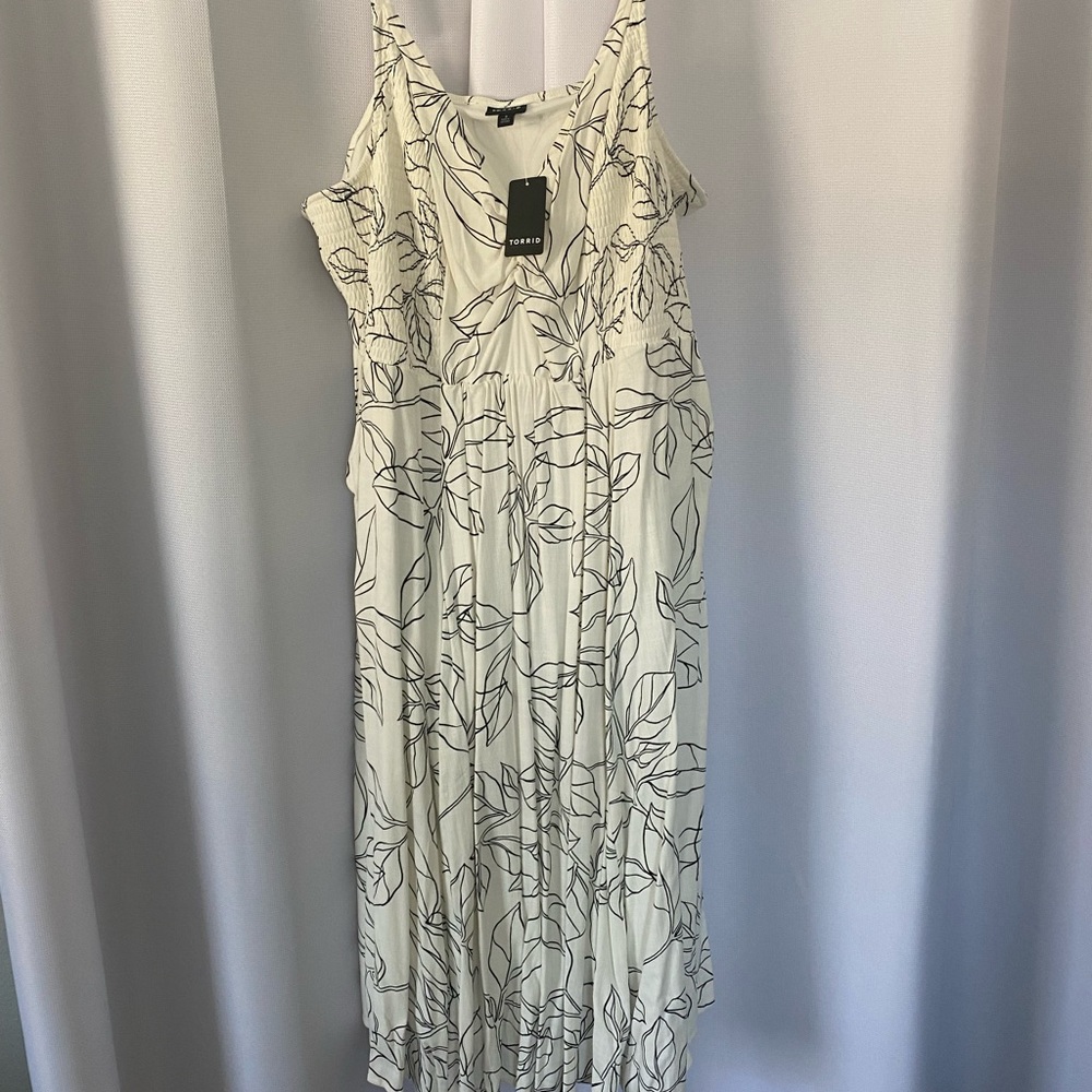 Torrid Midi Black and White Dress. Brand new, size 3X, flowery dress.
